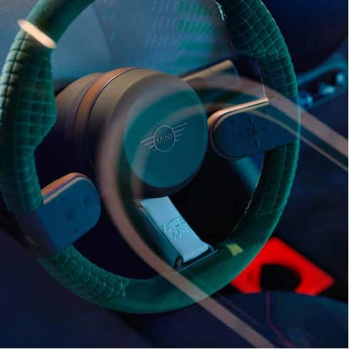Closeup view of the MINI Concept Aceman’s steering wheel made of leather-free material.
