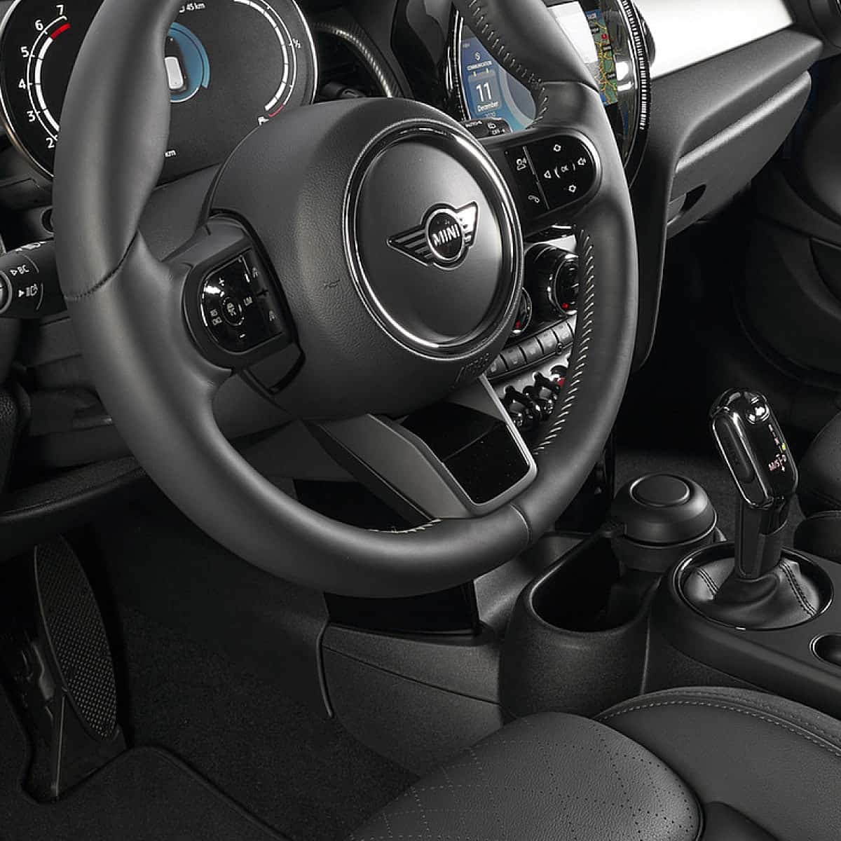 Close up of MINI interior, including steering wheel and clutch
