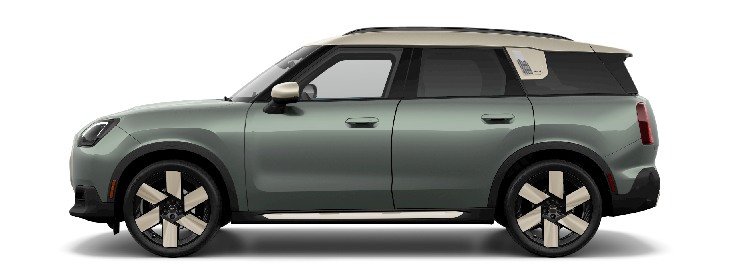 Side view of a 2025 MINI Countryman SE ALL4 in the Smokey Green body color, facing left with its shadow underneath it.